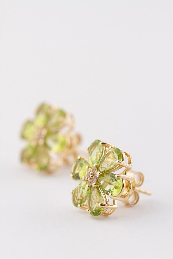Gold earrings with peridot and white sapphire