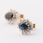 White/yellow gold earrings with a sapphire and 12 diamonds each