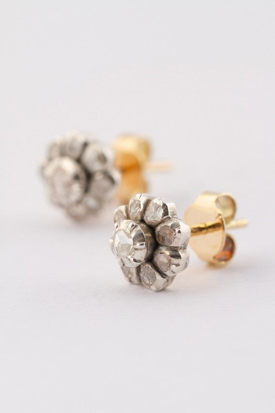 Antique gold entourage earrings with rose-cut diamonds set in silver