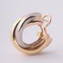Gold trinity stud earrings from Cartier