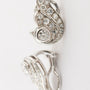 White gold clip-on earrings with brilliant and diamond