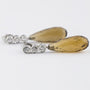 White gold earrings with brilliant and citrine