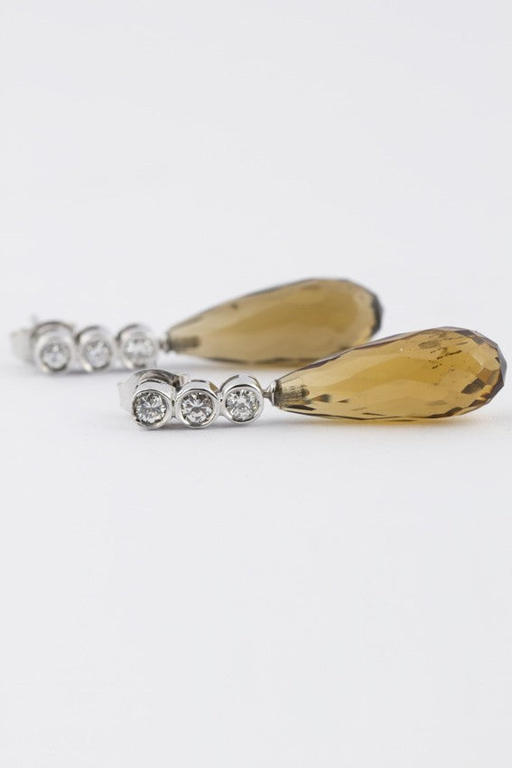 White gold earrings with brilliant and citrine