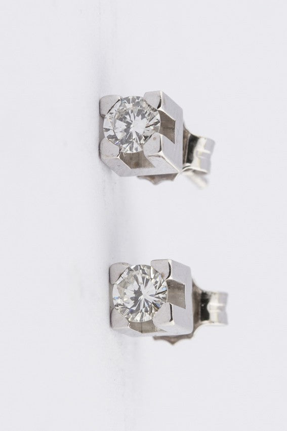 White gold solitaire earrings with brilliant
