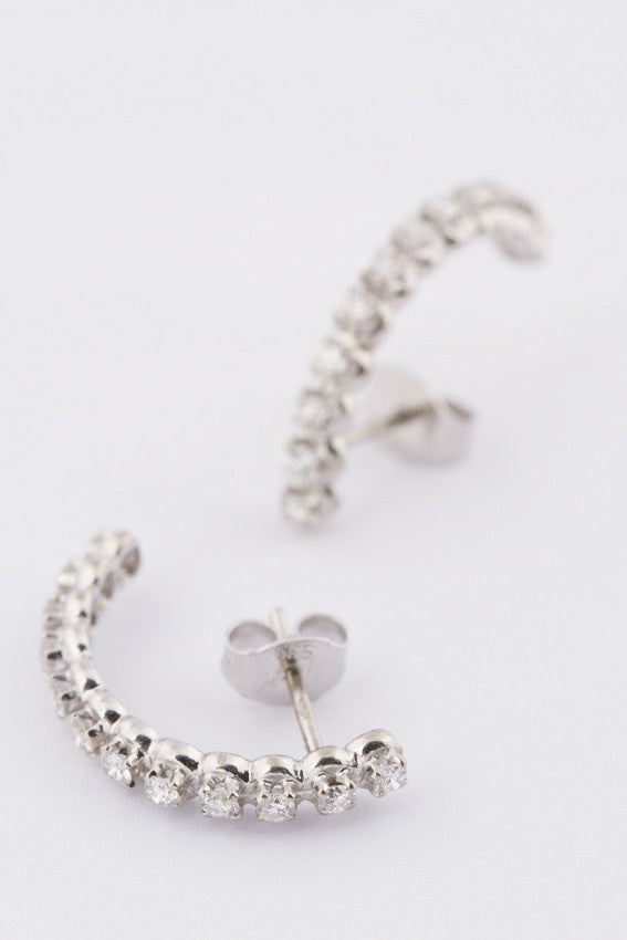 White gold half hoop earrings with diamonds