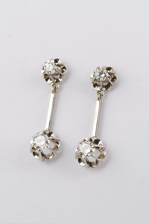 White gold earrings with 3 diamonds each
