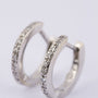 white gold earrings with 10 diamonds each