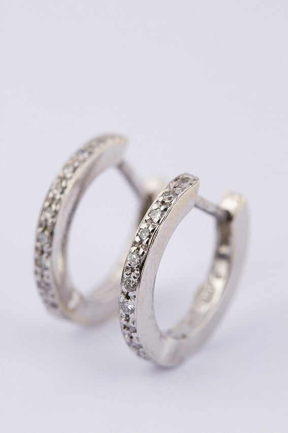 white gold earrings with 10 diamonds each