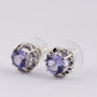Platinum solitaire stud earrings (bwg) with a tanzanite in each one