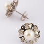 White gold earrings with pearl and diamonds