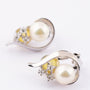 White gold earrings with pearl and brilliant
