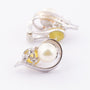 White gold earrings with pearl and brilliant
