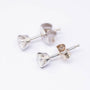 White gold solitaire earrings