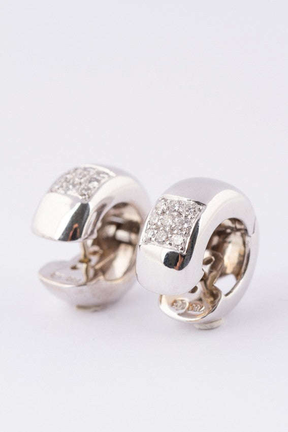 white gold earrings with 9 diamonds each