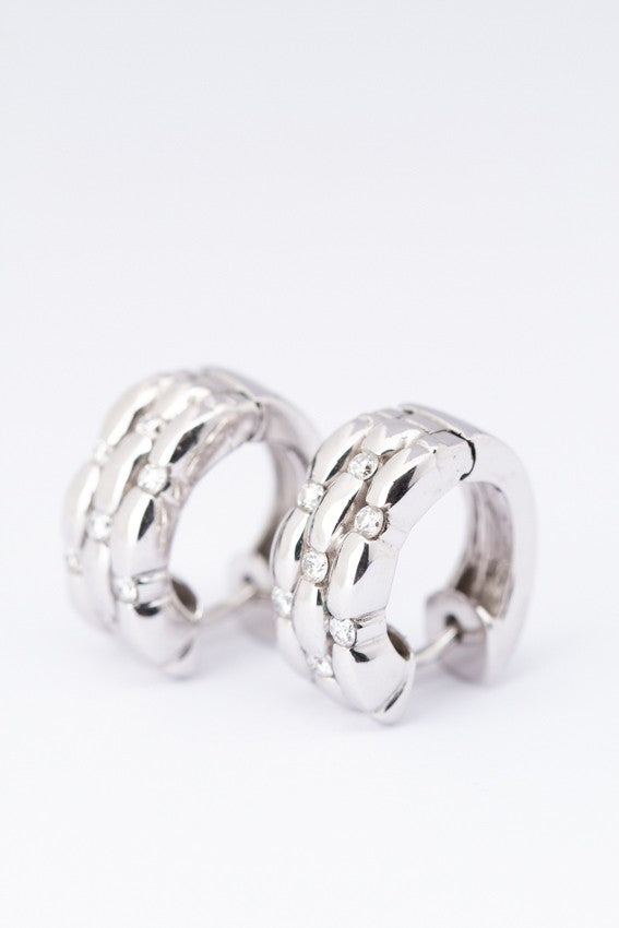 White gold earrings with 7 diamonds each