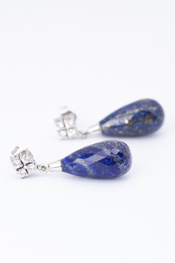 White gold earrings, each with a lapis lazuli and diamonds