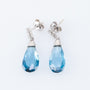 White gold earrings with topaz and diamonds