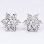White gold star earrings with diamonds