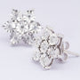 White gold star earrings with diamonds