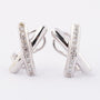 White gold stud earrings with 9 diamonds each