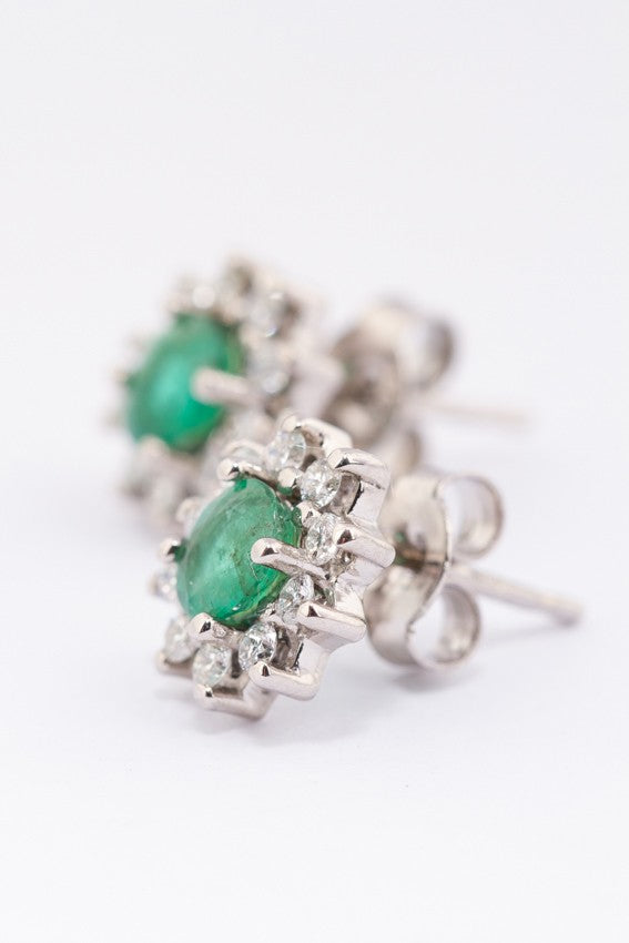 White gold entourage earrings with emerald and diamonds