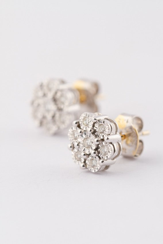 White gold entourage earrings with 7 diamonds each