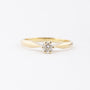Gold solitaire ring with a brilliant
