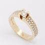 Gold band ring with diamonds