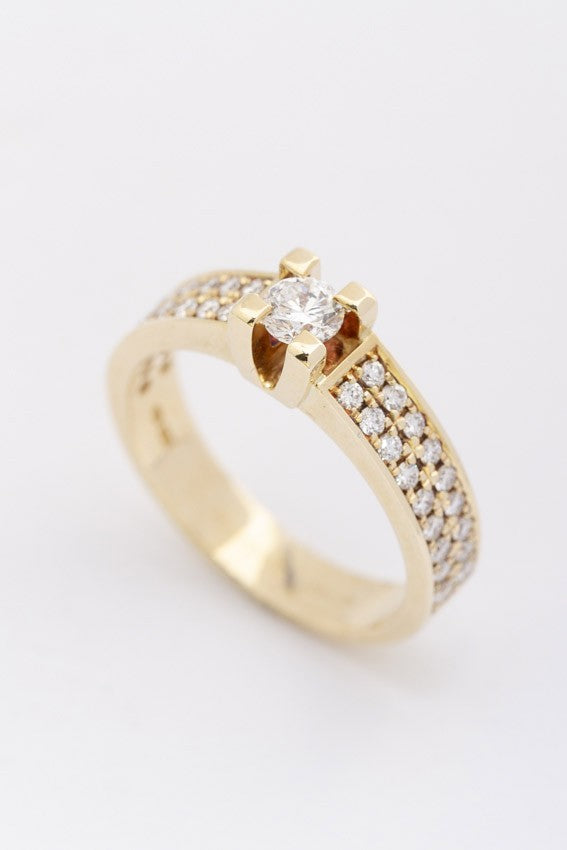 Gold band ring with diamonds