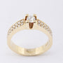 Gold band ring with diamonds