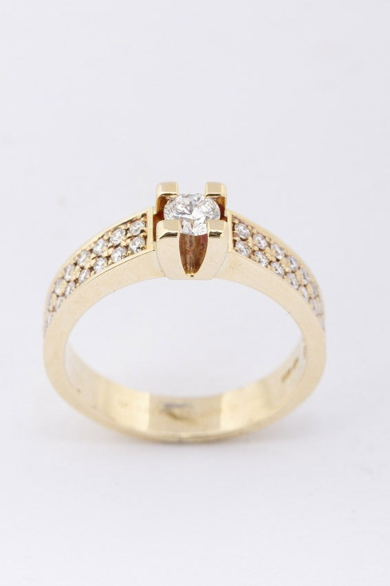 Gold band ring with diamonds