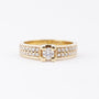 Gold band ring with diamonds
