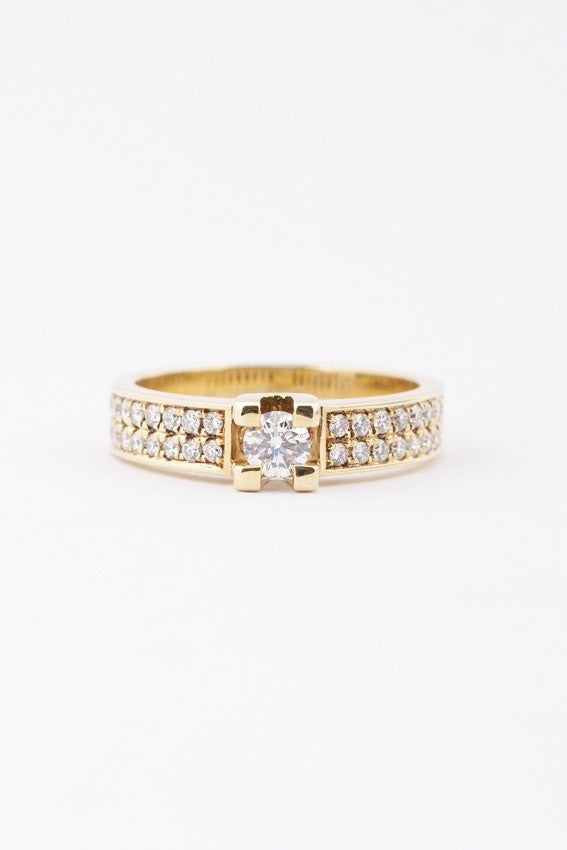 Gold band ring with diamonds