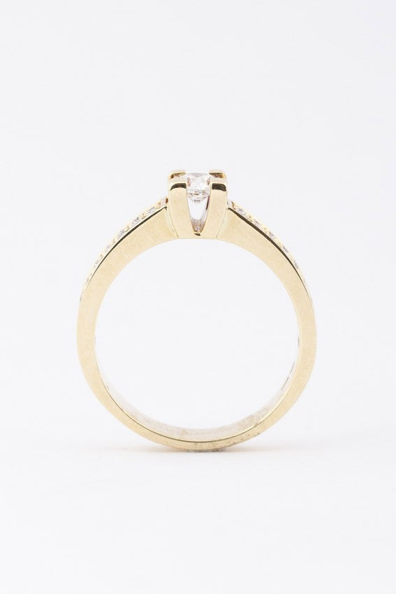 Gold band ring with diamonds