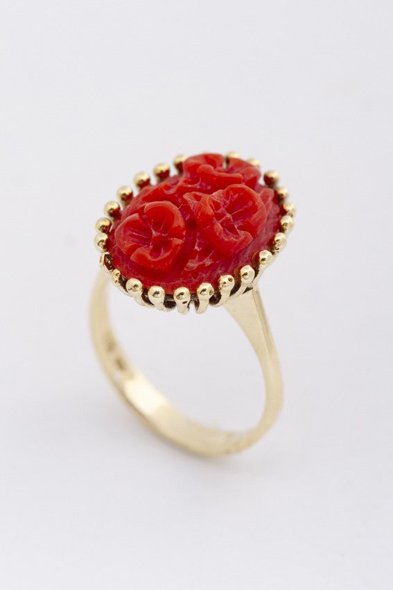 Gold ring with blood coral