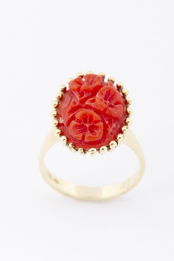 Gold ring with blood coral