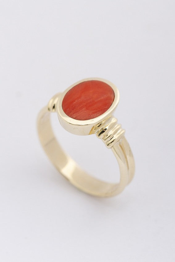 Gold ring with blood coral
