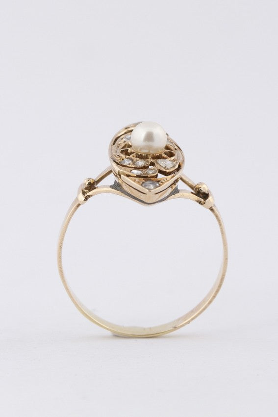 Gold marquise ring with a cultured pearl and diamonds