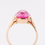 Gouden ring met synth. roze saffier