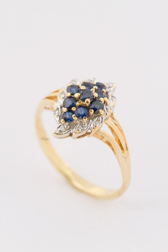 Gold marquise ring with sapphires and 10 brilliants