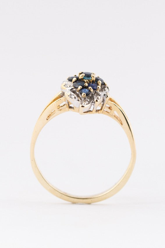 Gold marquise ring with sapphires and 10 brilliants