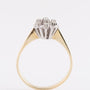 White/yellow gold entourage ring with a brilliant and diamonds
