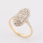 Wit/geel gouden Art Deco ring met een briljant van ca. 0.035 ct.