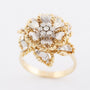 White/yellow gold entourage ring with diamonds