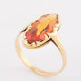 Gouden ring met een gele topaas