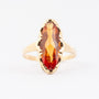 Gouden ring met een gele topaas
