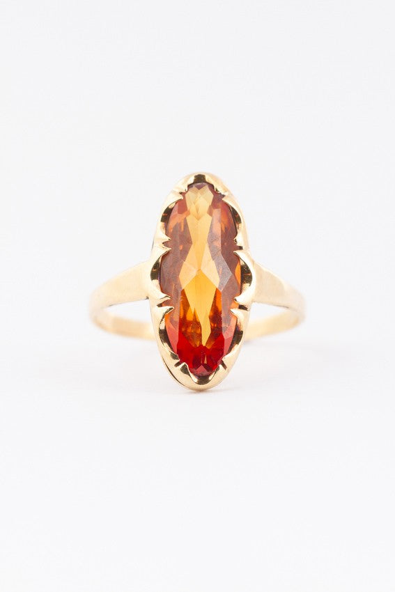 Gouden ring met een gele topaas