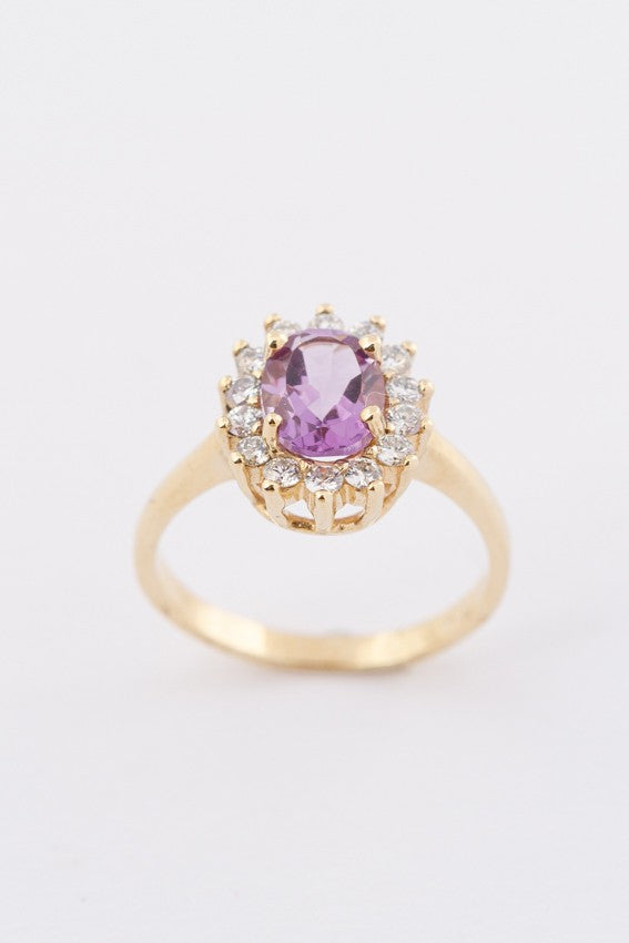 Gold entourage ring with amethyst and diamonds