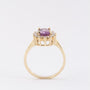 Gold entourage ring with amethyst and diamonds