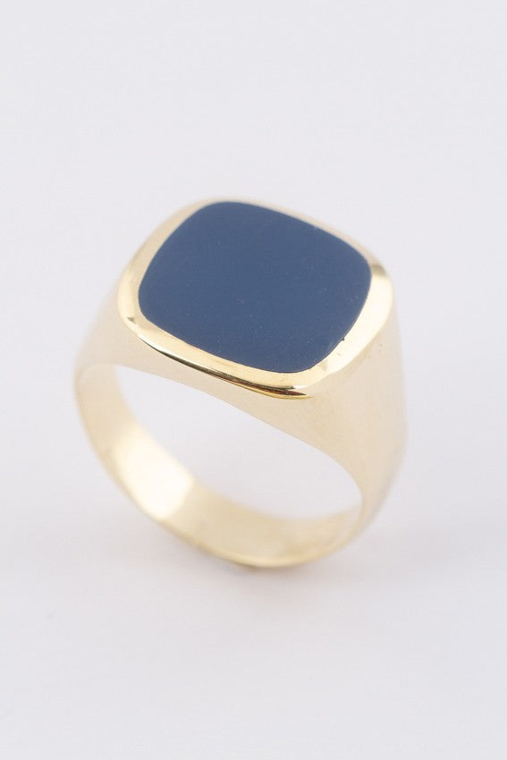 Gold men's ring with blue bearing
